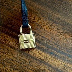 Michael Kors Gold Padlock with Black Strap